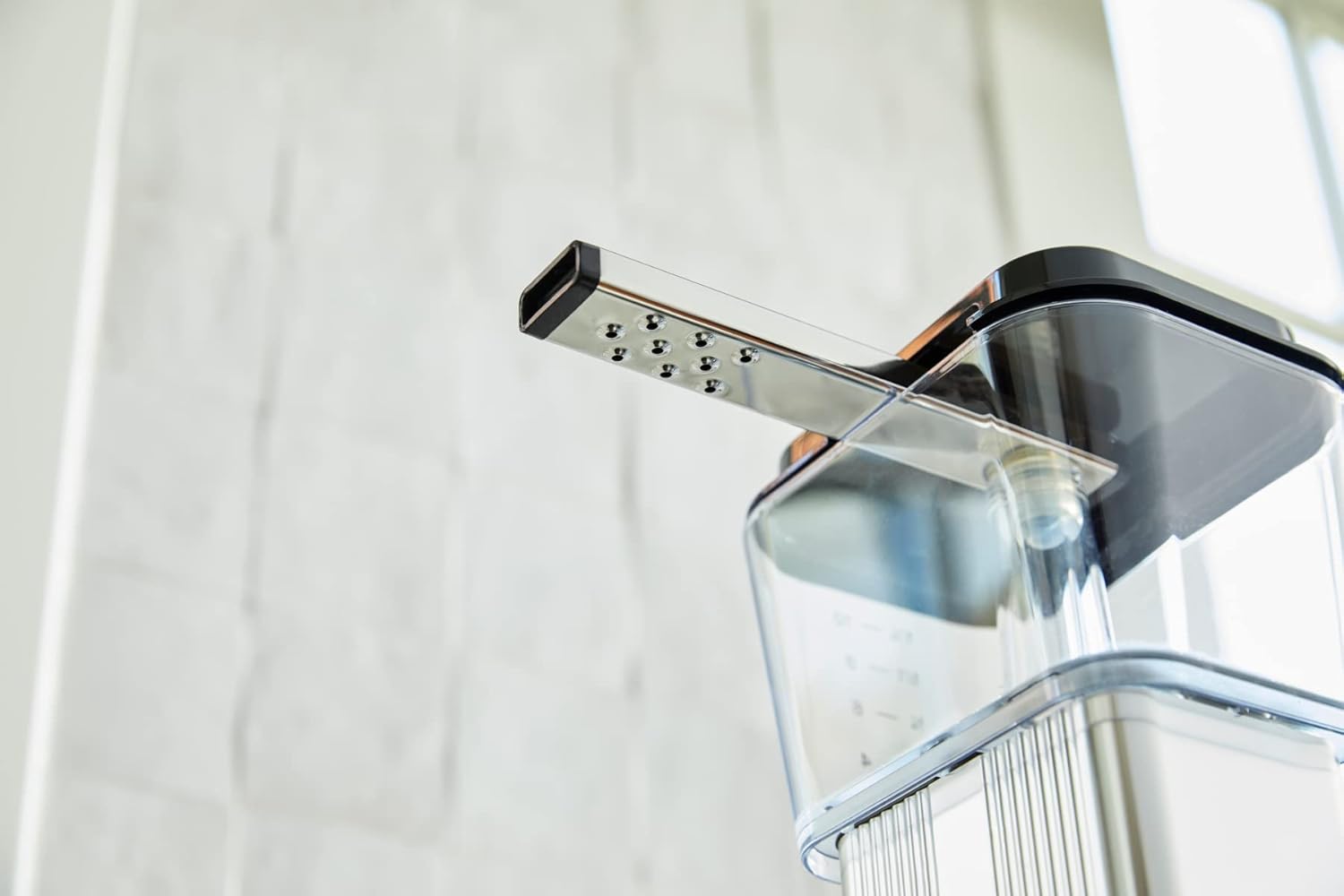 Technivorm Moccamaster 9-hole spray arm showerhead close-up