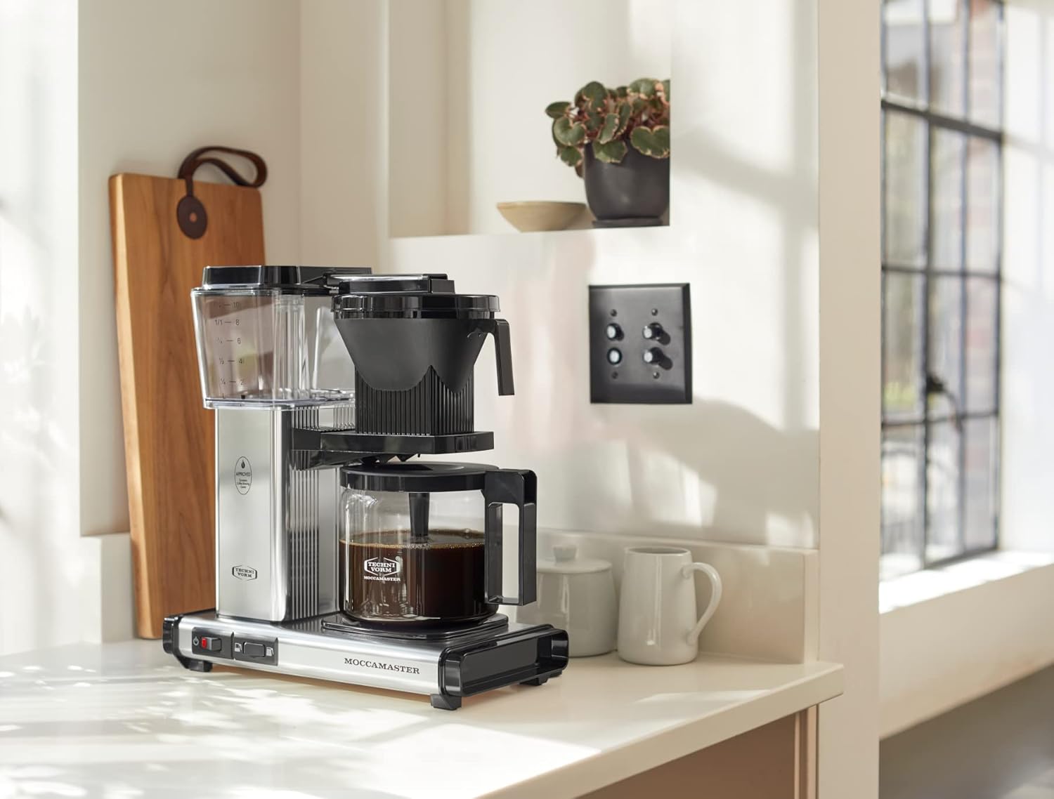 Technivorm Moccamaster KBGV Select on kitchen counter with brewed coffee